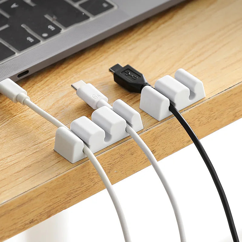 📋 Title:
Desktop Cable Organizer Silicone Cable Holder Clips Cord Wire Management Self Adhesive USB Cable Winder for Home Office (2 PCS)