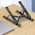 Adjustable Foldable Laptop Stand – Portable Desktop Riser with Heat Dissipation for Work & Travel
